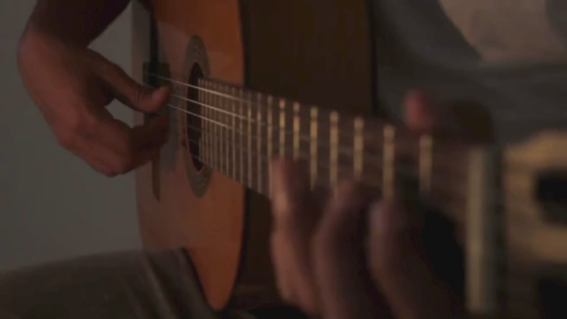 Load video: person playing guitar