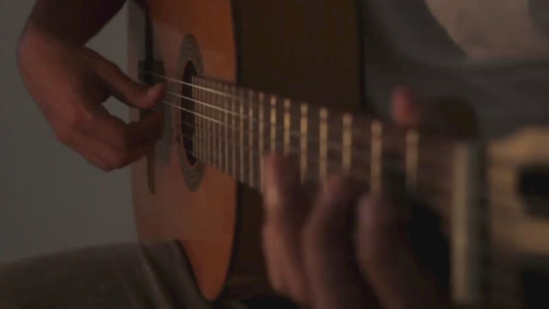 person playing guitar